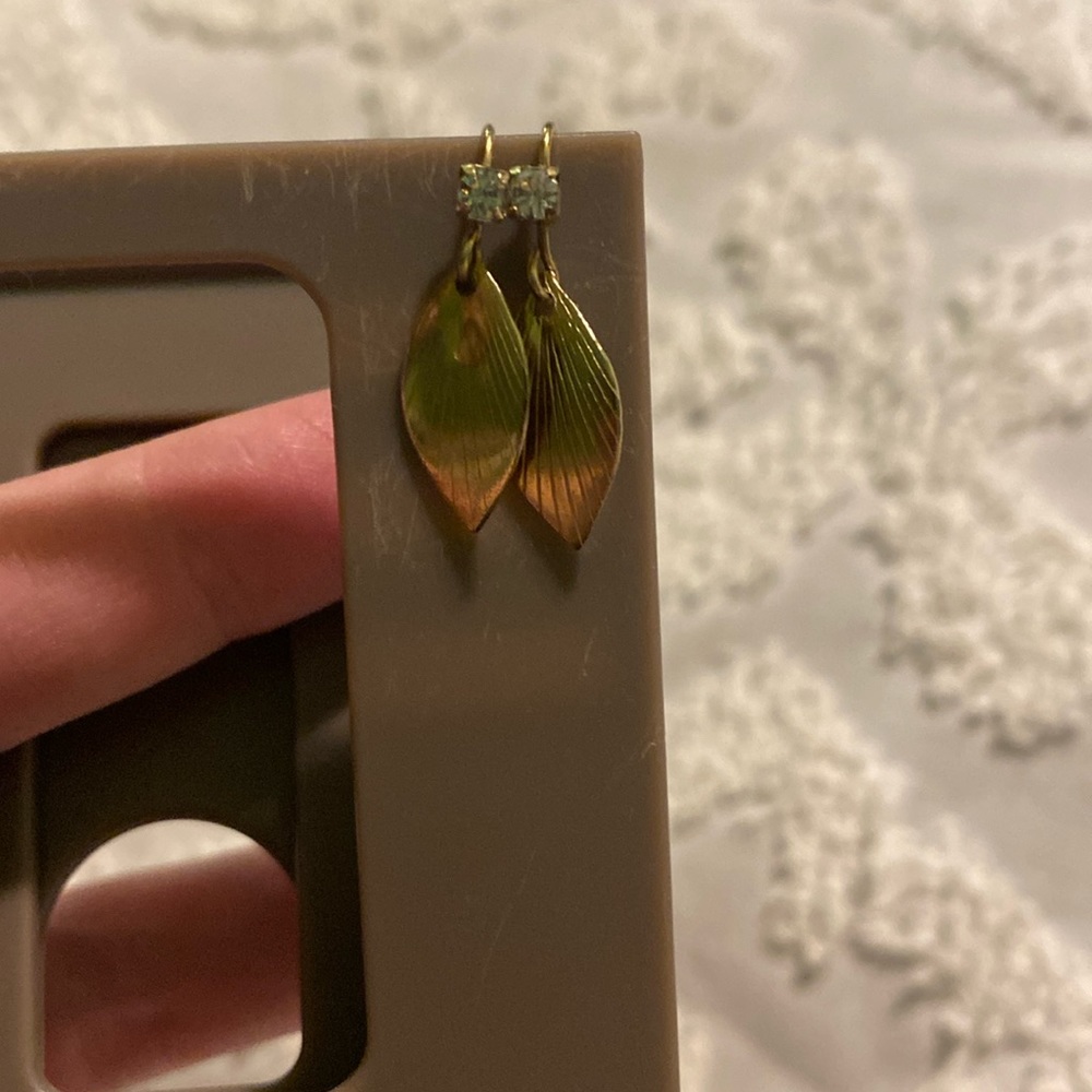 I’m sending gold leaf earrings with tiny diamonds